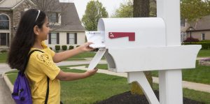 Student getting Enrichment at Home delivery from mailbox